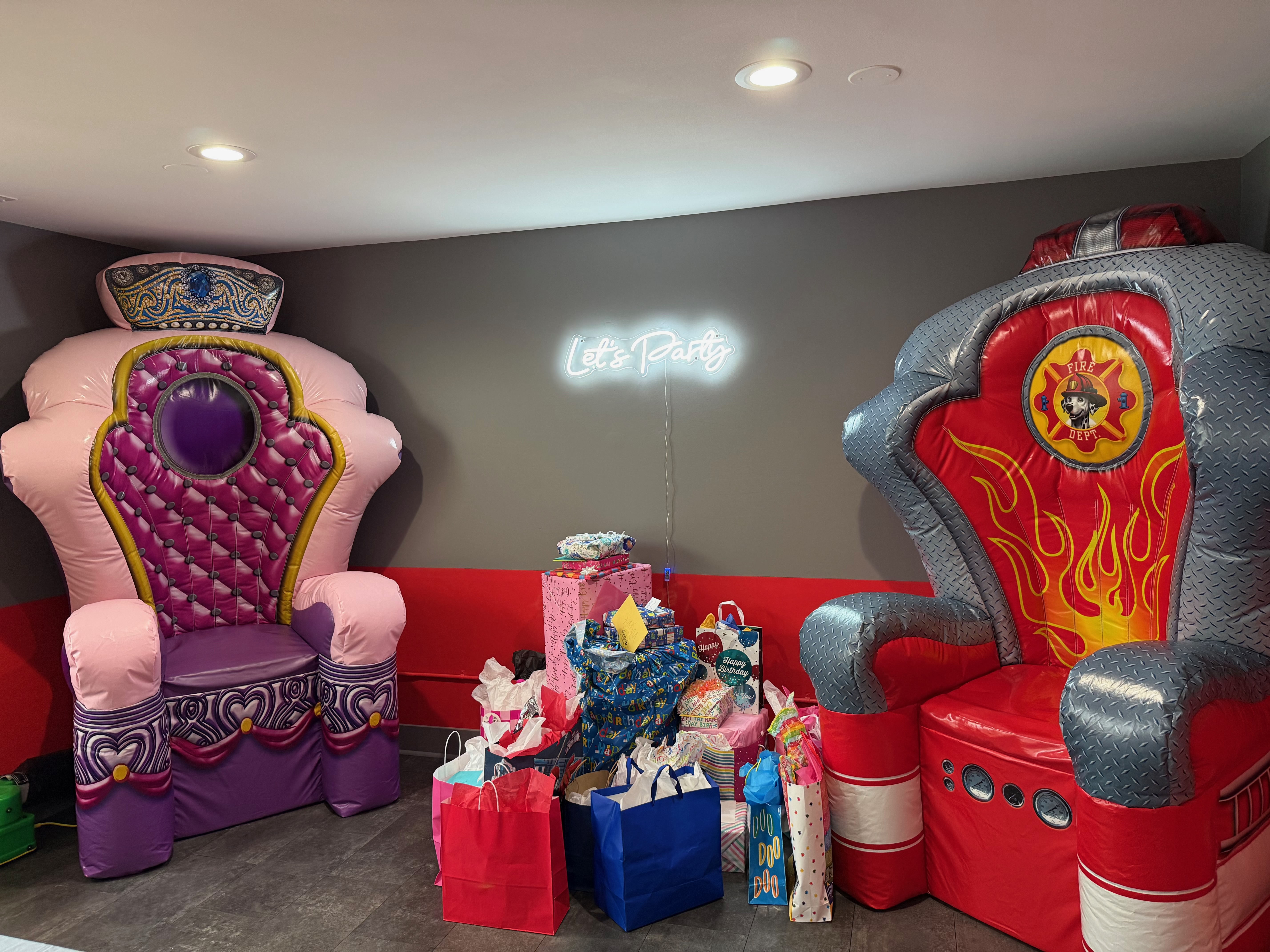 Princess and firefighter party thrones with gifts