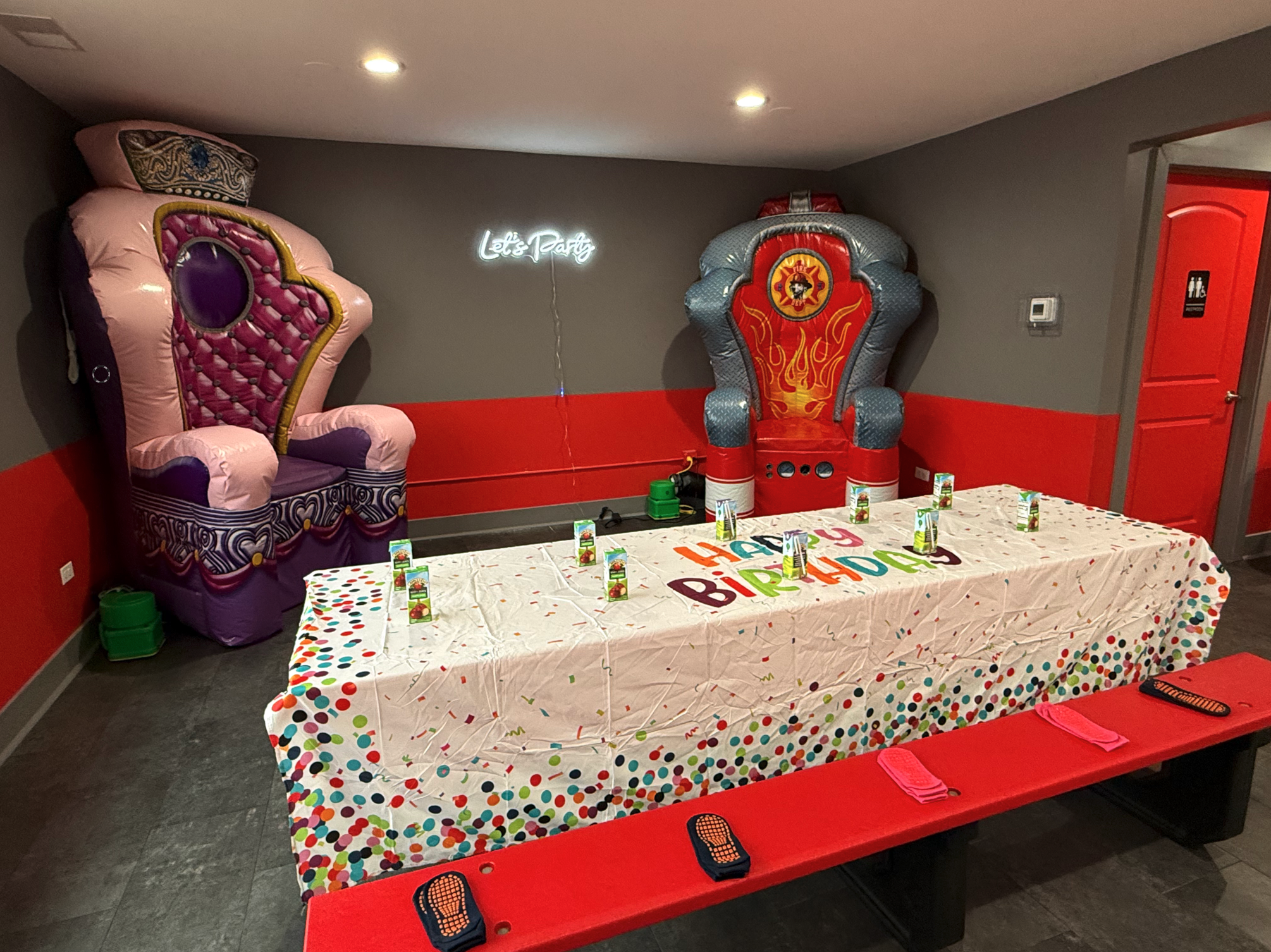Birthday table with party thrones and juice boxes