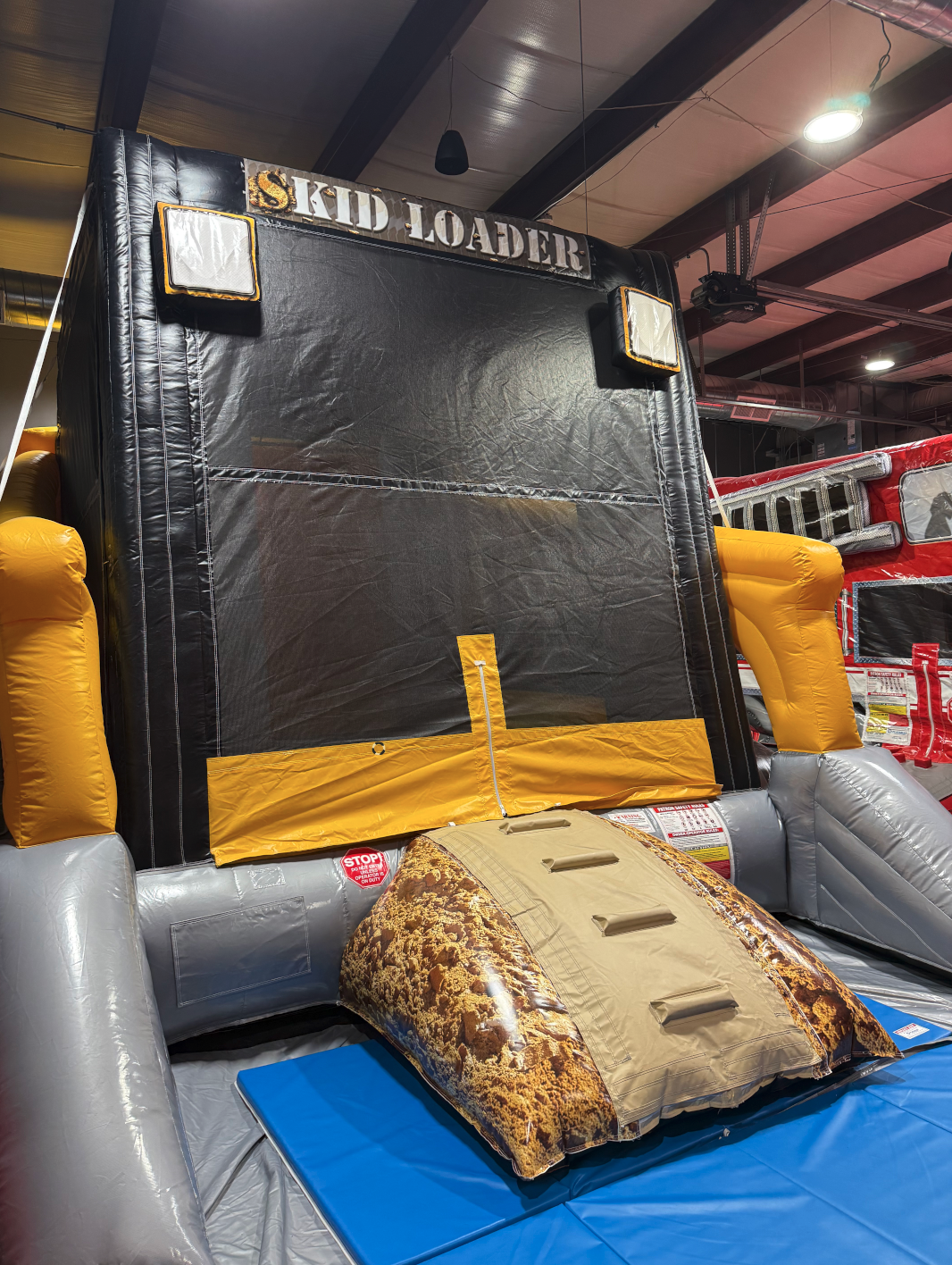 Skid Loader bounce house close-up